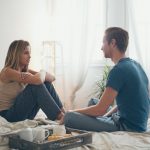 June2015-Trulia-What-To-Do-When-The-Appraisal-Is-Less-Than-the-Offer-couple-sitting-in-bed-having-conversation