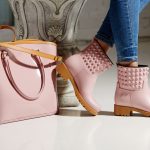 Rubber,Boots,In,Rainy,Weather,Pink,Color,And,A,Handbag